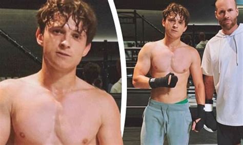 Tom Holland shows off his impressive physique in a shirtless .